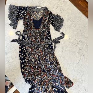 Long sheer navy floral wrap dress with navy slip underneath. Size L